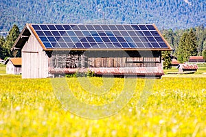 Barn wih photovoltaic cells on the roof