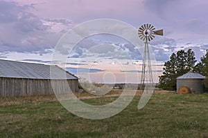 Barn, Windmill and Grain Bin on the Prairie