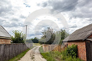 Barn with wooden fence in countryside