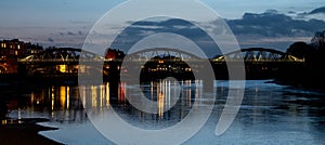 Barnes Railway Bridge in west London, a Grade II listed structure, photographed during blue hour on a cold, clear winter`s evening