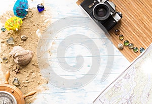 Barometer with shell in the sand on a wooden background