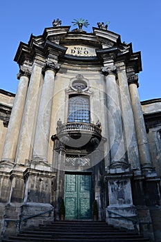 Baroque catholic church facade against blue sky