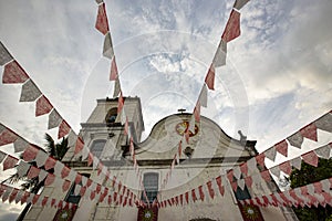Baroque church decorated with flags of Festa Junina