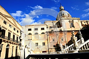 Baroque church & Pretoria square statues. Palermo photo