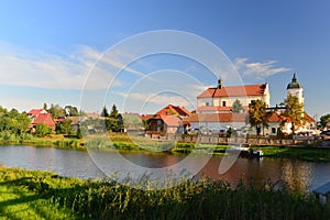 Poland. Baroque church and river in Tykocin