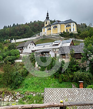 Baroque Church of St. Martin is located on a hill above the village of Srednja vas