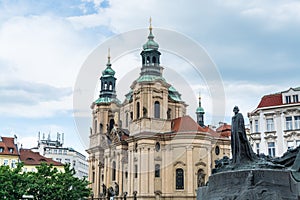 Baroque Church Of St Nicholas Of Old Town and Jan  Hus Memorial at the Prague old town square,  the central square of the