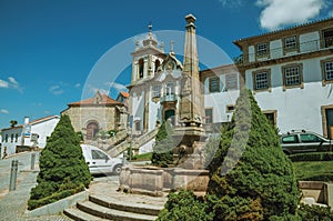 Baroque church with stone pillory