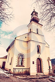 Baroque-Classicist Roman-Catholic church in Vlkolinec, red filter