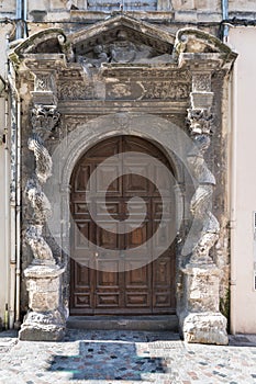 Baroque doorway with twisted columns in Arles,  France