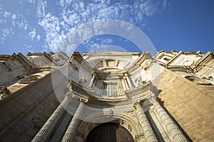 Baroque facade of the cathedral of CÃ¡diz, Andalusia, Spain from below photo