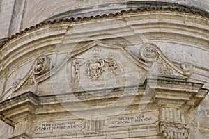 A baroque facade over the door one of the churches in the historial center of Matera town, Basilicata