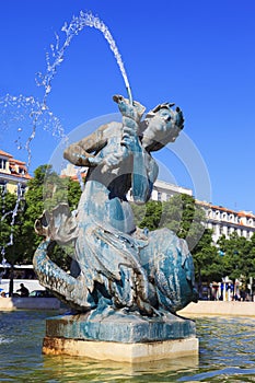 Baroque fountain on rossio square