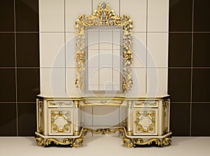 Baroque gold mirror with royal chest