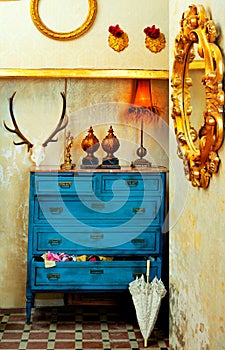 Baroque grunge vintage house with blue drawer photo