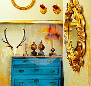 Baroque grunge vintage house with blue drawer photo