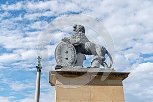 Baroque lion sculpture in front of `Neues Schloss`