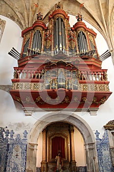 Baroque pipe organ of the 18th century inside the church of Monastery of Santa Cruz, Coimbra, Portugal