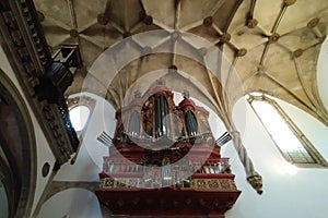 Baroque pipe organ of the 18th century inside the church of Monastery of Santa Cruz, Coimbra, Portugal