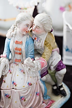 Baroque porcelain figures - flirting lovers at a rendezvous