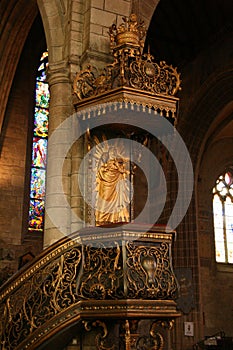baroque pulpit in a medieval church (notre-dame-du-roncier basilica) in josselin in brittany (france)