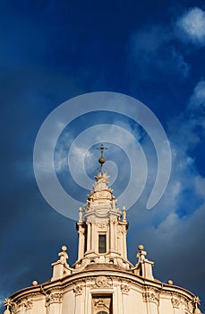 Baroque spiral with clouds in Rome