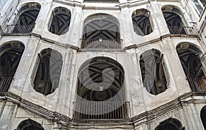 The baroque stairs of Palazzo Sanfelice , Naples Italy photo