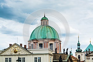 Baroque style Church of St Francis Seraph St. Francis of Assisi Church on the bank of Vltava river, Old town of the Prague photo