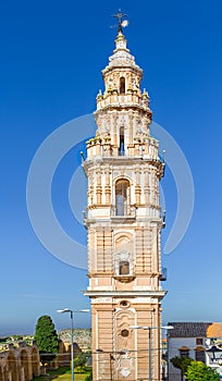 Baroque Tower of Victory in Estepa, province of Seville. Charming white village in Andalusia. Southern Spain.