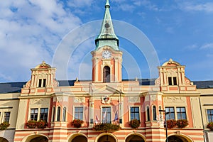 Baroque town hall at main Peace square of historic medieval royal town Melnik in sunny autumn day, forged balcony with flags and