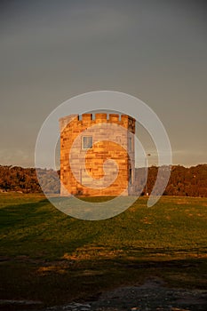Barrack castle-style tower down at La Perouse, on the top of the hill during golden hour