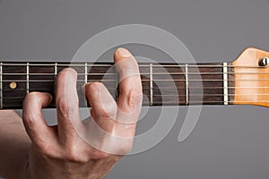 Barre chord on electric guitar