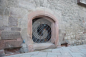 Barred Basement Window of Medieval Building