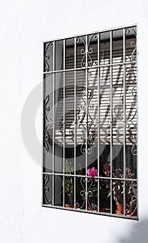 Barred Window and Blind ( Spain )