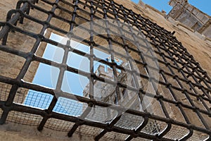 Barred window of a monastery in Valencia, Spain.