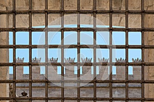 Barred window of a monastery in Valencia, Spain.