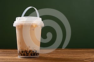 barrel of milktea with tapiocas horizontal composition