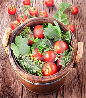 Barrel of pickled tomatoes photo