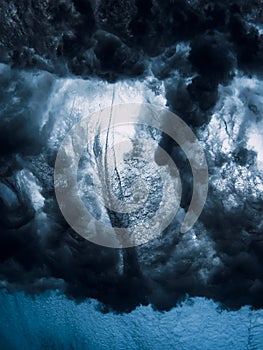 Barrel wave crash with vortex underwater in crystal ocean. Stormy water texture