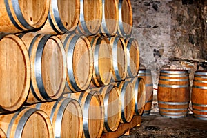 Barrel of wine in winery.