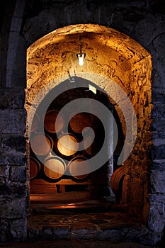 Barrel of wine in winery.