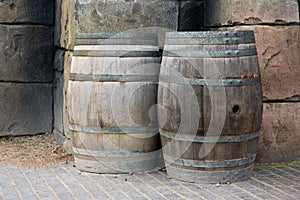 Barrels against a wall