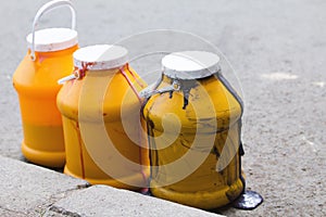 Barrels with foul wasted melting ice cream