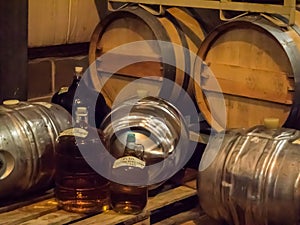 Barrels of wine in winery cellar