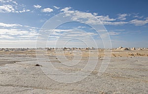 Barren desert landscape in hot climate with rock formation
