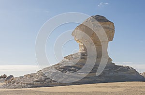 Barren desert landscape in hot climate with rock formation