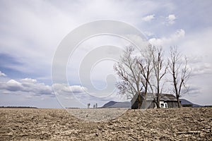 Barren field and barn photo