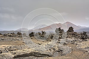 Barren landscape of Timanfaya photo