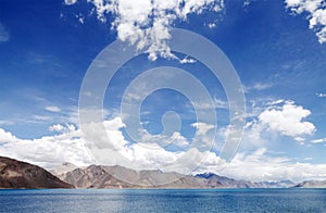 Barren mountains and blue pangong lake