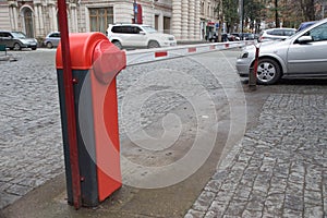 Barrier on car parking building hall with colomn, automatic entry system